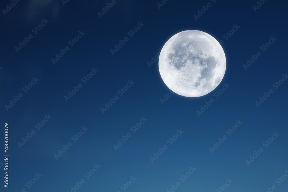 Full Moon on a blue evenign sky. Full Moon on a blue evenign sky.