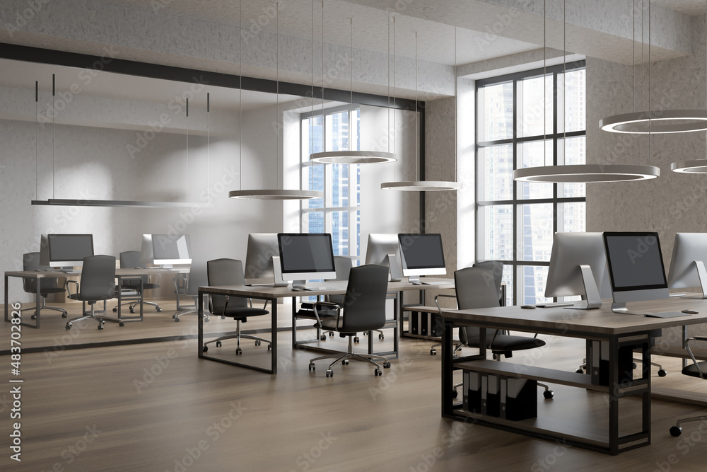 Bright office room interior with workplaces and panoramic windows
