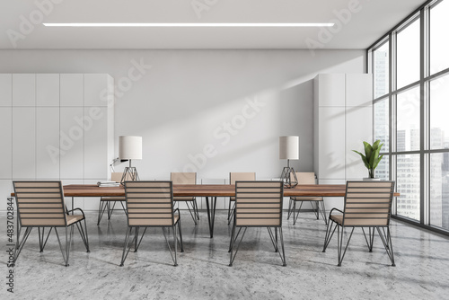 Light office room with minimalist furniture, panoramic windows and mockup