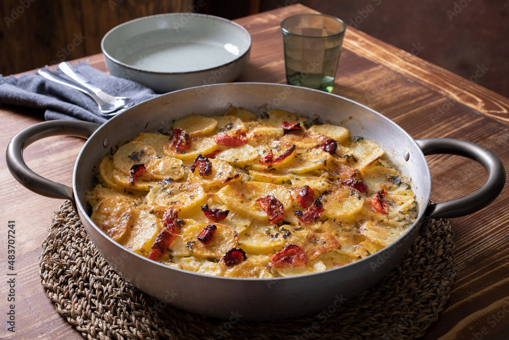 patate al forno con riso e pomodori patate al forno con riso e pomodori
