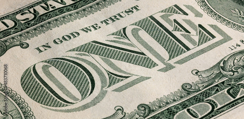 one US dollar with central inscription close up