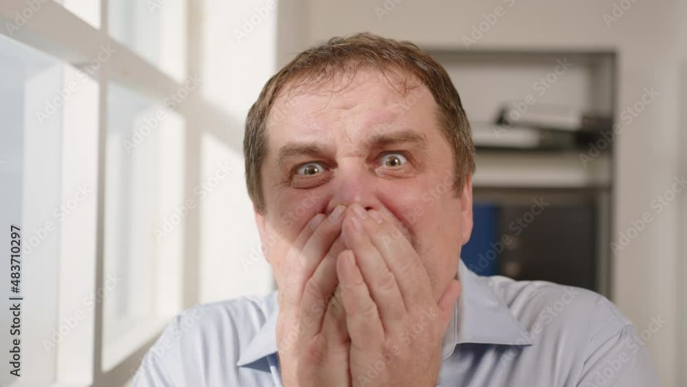 Portrait of serious man praying with his hands folded on in prayer in hope asking of help. Portrait of serious man praying with his hands folded on in prayer in hope asking of help.