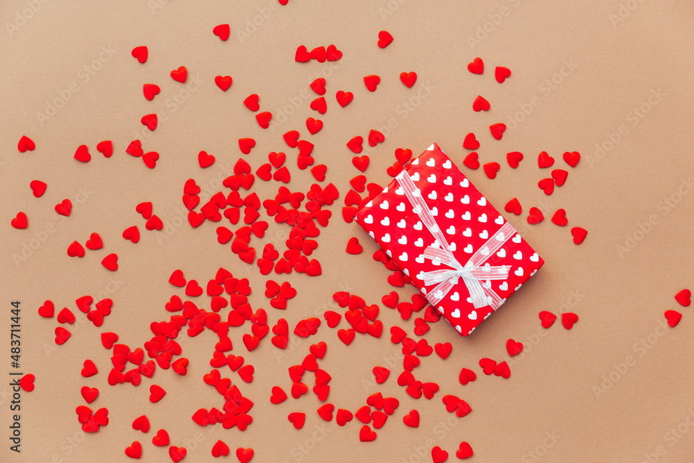 Valentine's Day concept with red hearts and gift box. Flat lay, copy space Valentine's Day concept with red hearts and gift box. Flat lay, copy space