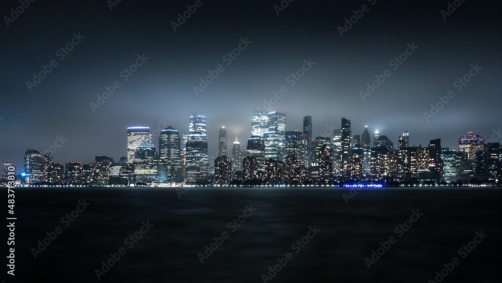 View from Liberty State Park in New Jersey of the New York City Cityscape at Night on a Foggy Day