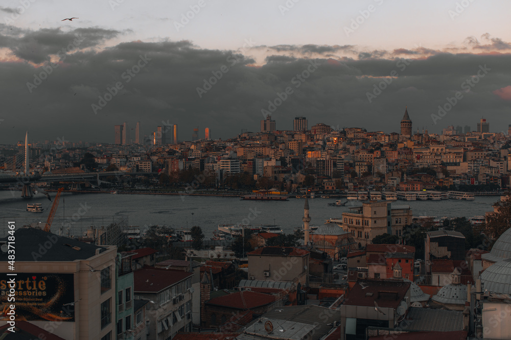 Black Sea, moody evening sky and beautiful view of Istanbul city with vintage buildings, Turkey