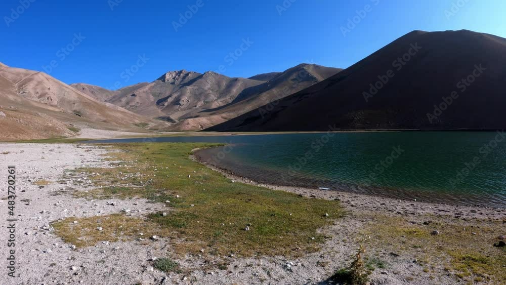 Little Arashan lake shore, lush green grass and mountain scenery Little Arashan lake shore, lush green grass and mountain scenery
