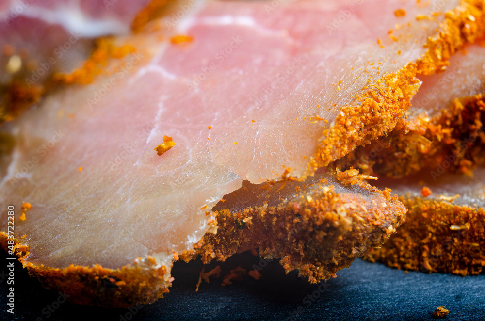 Fototapeta premium Chicken carpaccio close-up sliced with spice breading