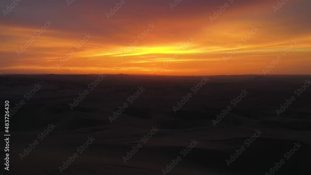 Gorgeous Sunset over Peru's Desert Sand Dunes - Aerial with Copy Space Gorgeous Sunset over Peru's Desert Sand Dunes - Aerial with Copy Space