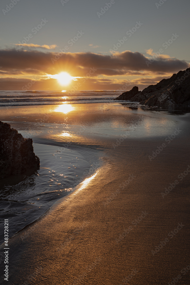 Obraz premium Freathy Beach in Whitsand Bay South East Cornwall at sunset and low water