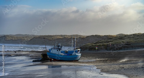 Tableau sur toile traditional fisher boats on the beach in northern Denmark in norre vorupor on a