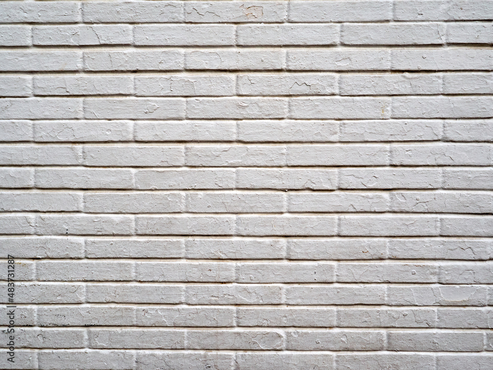 Background of a white brick wall. Grunge, dirty, weathered white bricks. Copy space Background of a white brick wall. Grunge, dirty, weathered white bricks. Copy space