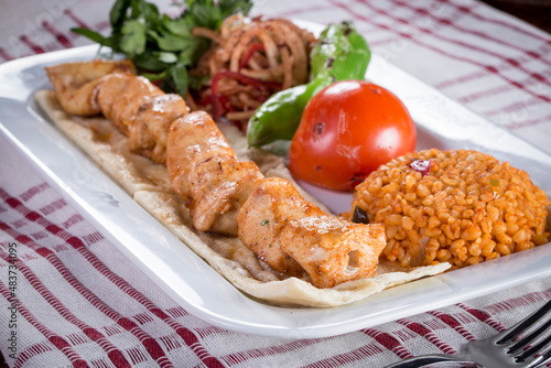 traditional chicken skewer with bulgur pilaf tavuk sis kebab
