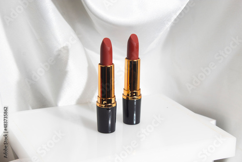 mockup of lipstick cosmetic makeup product, branding of beauty fashion, red rose lips on white background photo