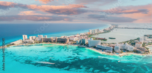 View of beautiful Hotels in the hotel zone of Cancun at sunset. Riviera Maya region in Quintana roo on Yucatan Peninsula photo