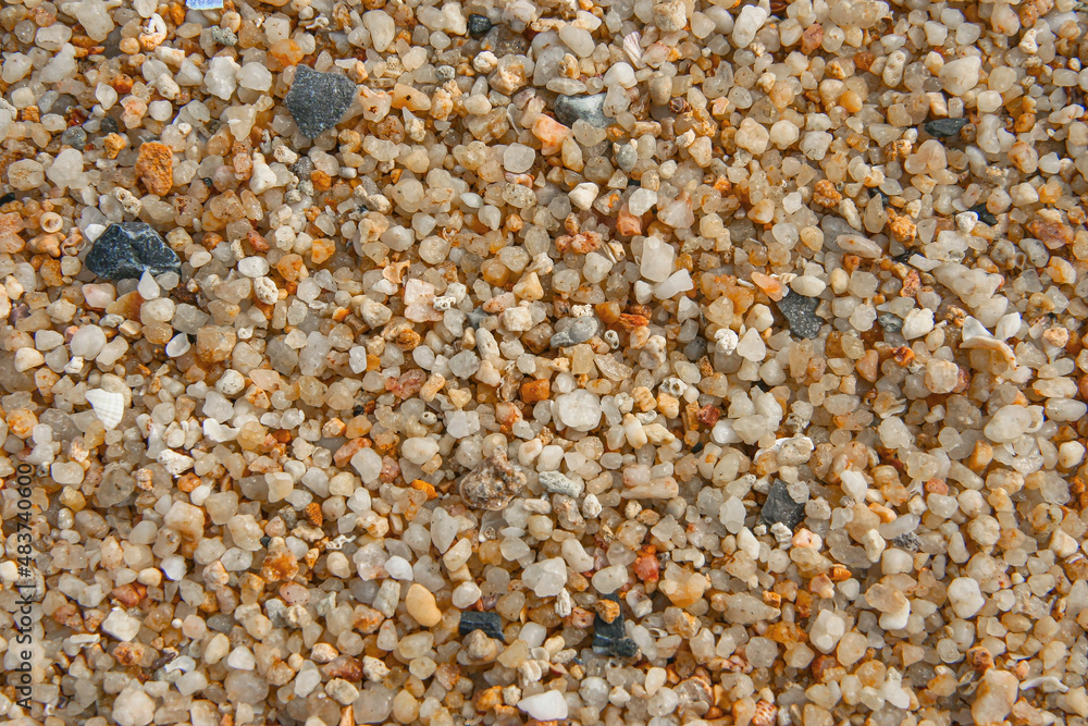 Close up of stones and marble. Smooth and polished. Pebble on shingle beach. Colorful small pebble and stone texture. Pebble background. Gravel pebble or rock fragments, beach sand Close up of stones and marble. Smooth and polished. Pebble on shingle beach. Colorful small pebble and stone texture. Pebble background. Gravel pebble or rock fragments, beach sand
