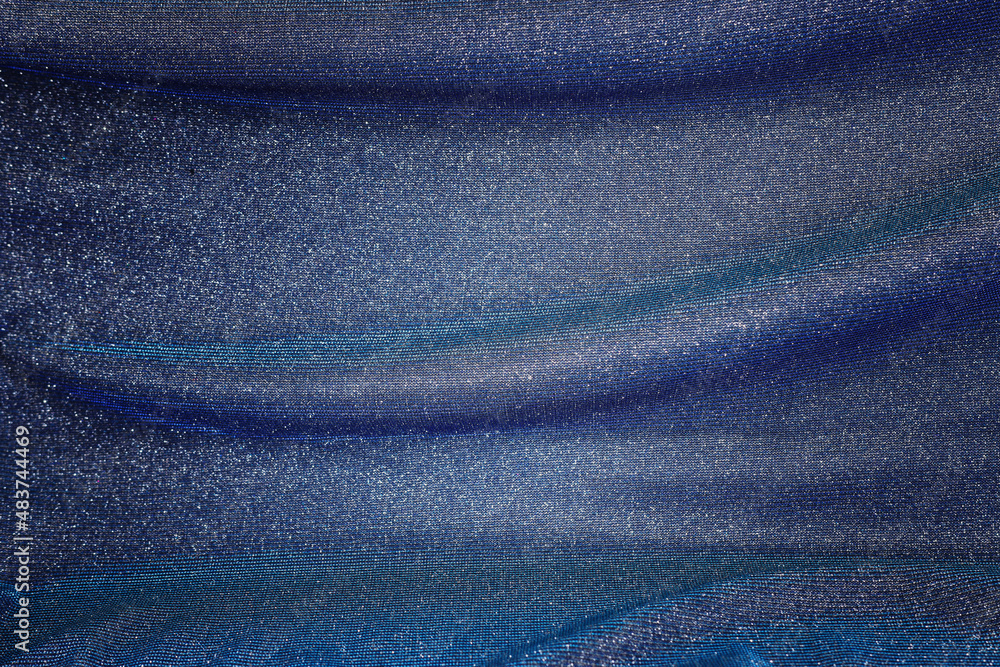 Naklejka premium background of beautiful dark blue glitter fabric