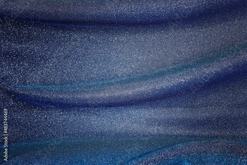 background of beautiful dark blue glitter fabric