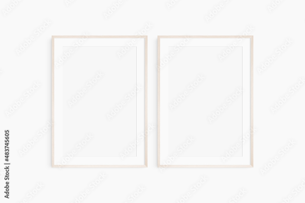 Frame mockup 5x7, 50x70, A4, A3, A2, A1. Set of two thin light wood frames. Gallery wall mockup, set of 2 frames. Clean, modern, minimalist, bright. Portrait. Vertical. Mat opening 2:3. Frame mockup 5x7, 50x70, A4, A3, A2, A1. Set of two thin light wood frames. Gallery wall mockup, set of 2 frames. Clean, modern, minimalist, bright. Portrait. Vertical. Mat opening 2:3.