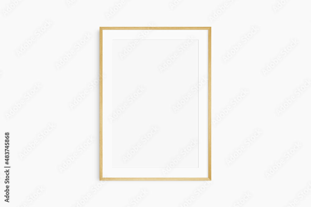 Frame mockup 5x7, 50x70, A4, A3, A2, A1. Single oak wood frame mockup. Clean, modern, minimalist, bright. Portrait. Vertical. Passepartout/mat opening in 2:3 aspect ratio. Frame mockup 5x7, 50x70, A4, A3, A2, A1. Single oak wood frame mockup. Clean, modern, minimalist, bright. Portrait. Vertical. Passepartout/mat opening in 2:3 aspect ratio.