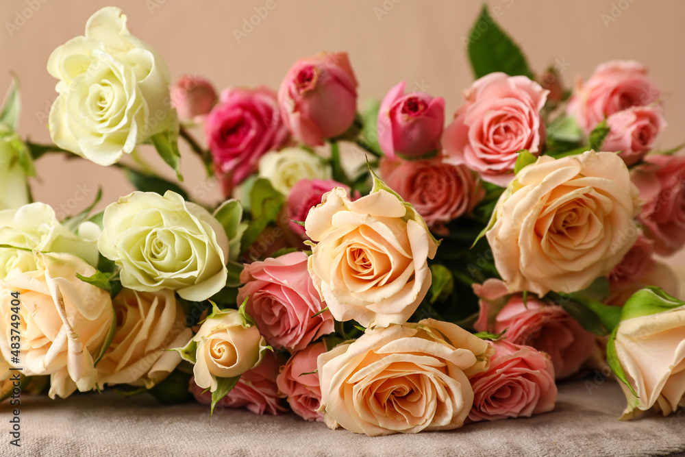 Bouquet of beautiful roses on table, closeup Bouquet of beautiful roses on table, closeup