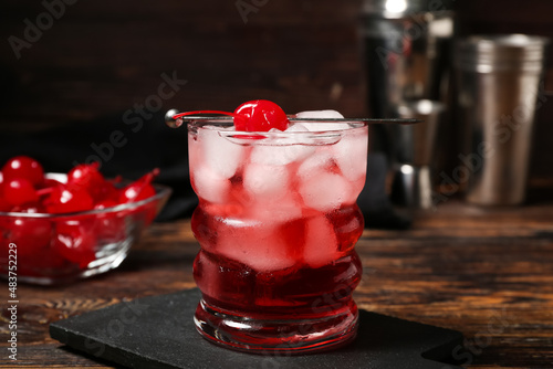 Wallpaper Mural Glass of tasty Manhattan cocktail on dark wooden background Torontodigital.ca
