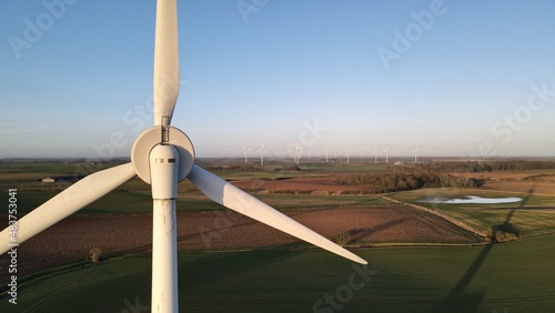 Close-up drone view of working Wind Turbines in a field in Withernsea, UK