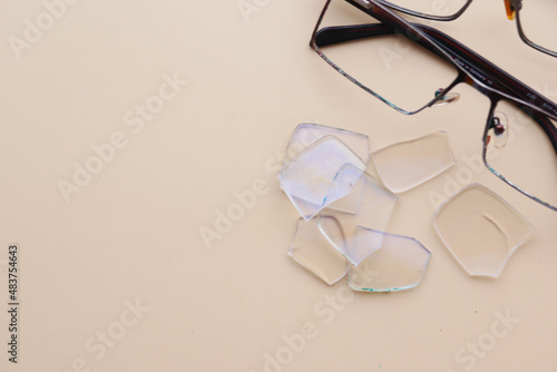 broken eye glass on table with copy space 