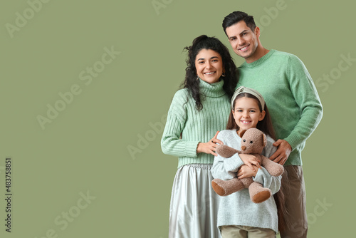 Happy parents with little d...