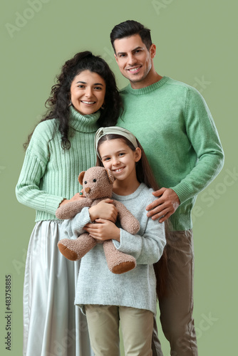 Happy parents with little d...