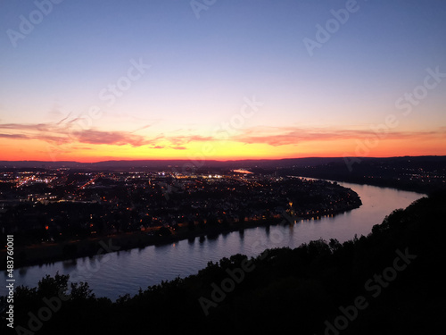 urban cityscape at dusk in the sunset. Koblenz on the Rhine