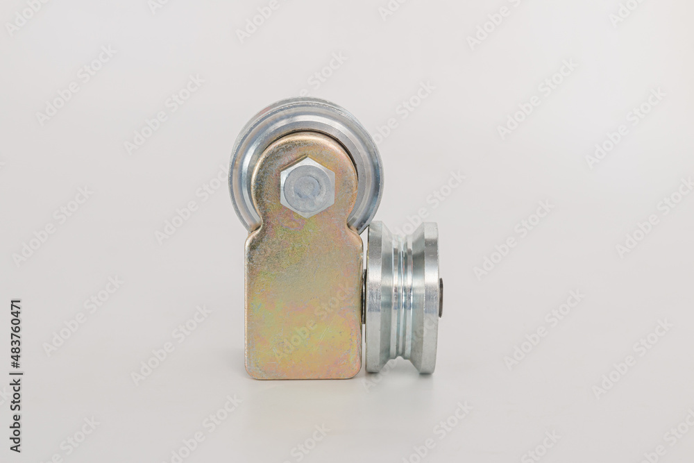 Groove door wheel with bearing on white background Groove door wheel with bearing on white background