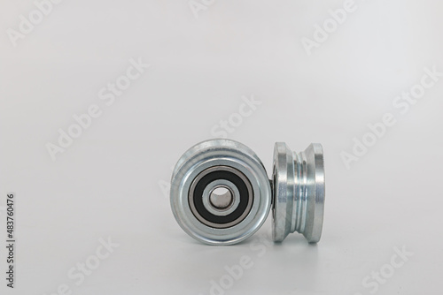 Groove door wheel with bearing on white background