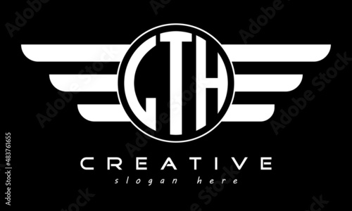 LTH three letter monogram type circle letter logo with wings vector template. photo