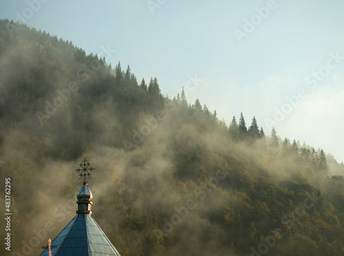 Morning fog in the high-mountainous Hutsul village of the Ukrainian Carpathians.