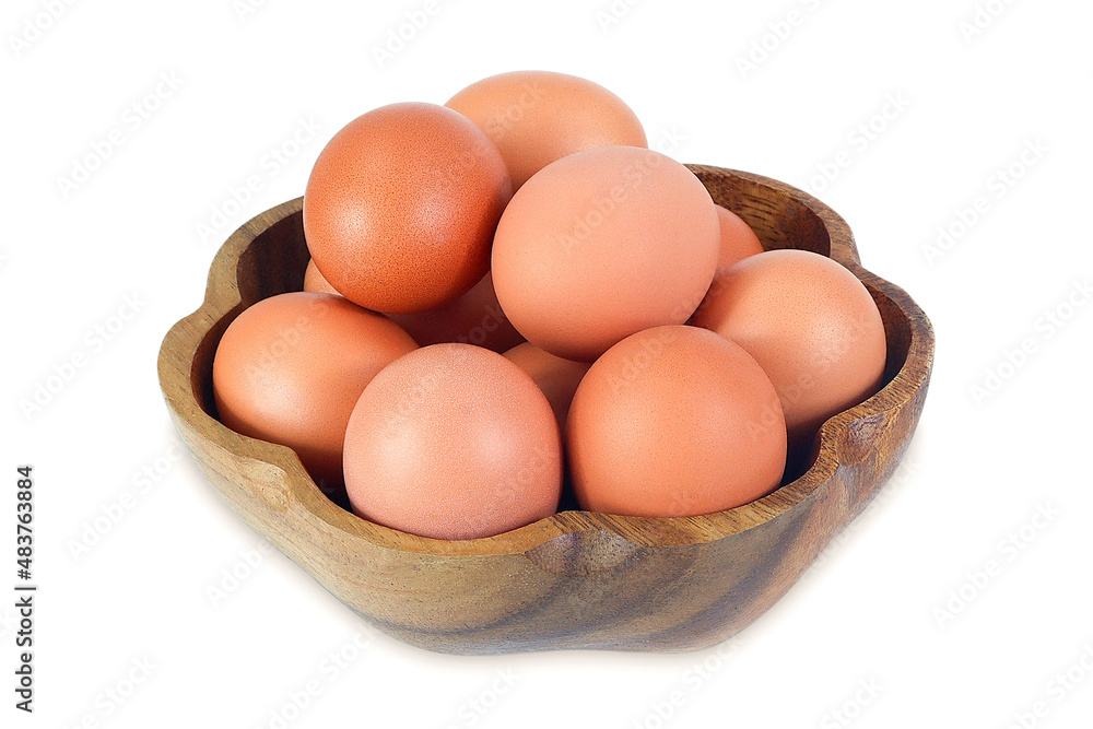 Chicken eggs on an isolated white background. Eggs in a wooden city Chicken eggs on an isolated white background. Eggs in a wooden city
