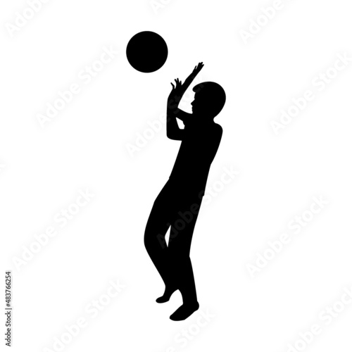 Silhouette of male kid throwing a ball
