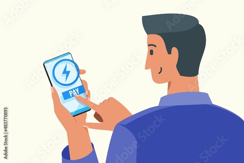 Young Man Paying Electric Bill or Voucher Online