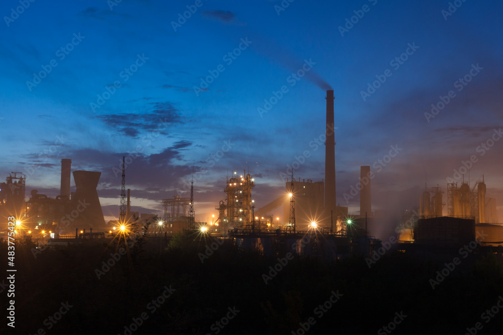The steel plant pollutes the air. Ecology