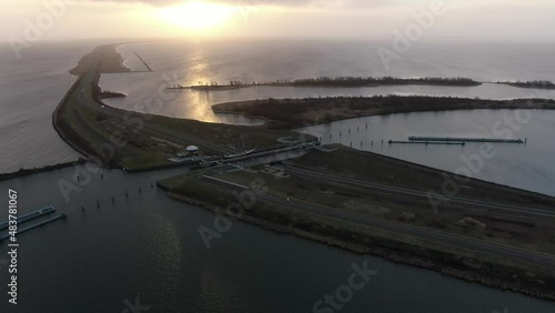 4k aerial drone video of aquaduct with sluice construction and road passing underneath in the Netherlands  photo