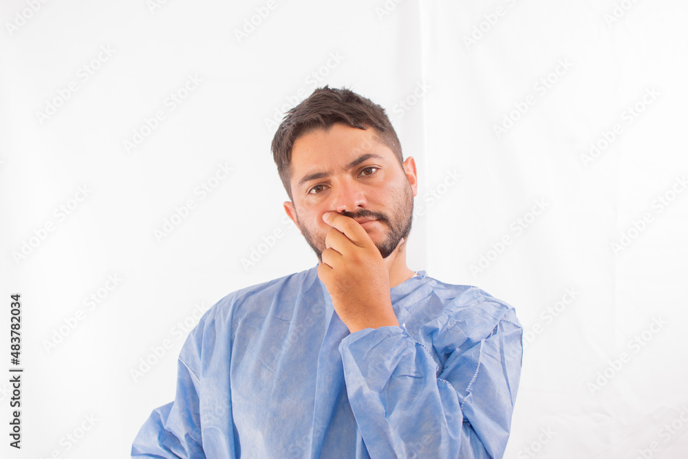 Portrait of tired exhausted nurse or doctor having a coffee break outside in the morning. COVID-19, Coronavirus pandemic Portrait of tired exhausted nurse or doctor having a coffee break outside in the morning. COVID-19, Coronavirus pandemic