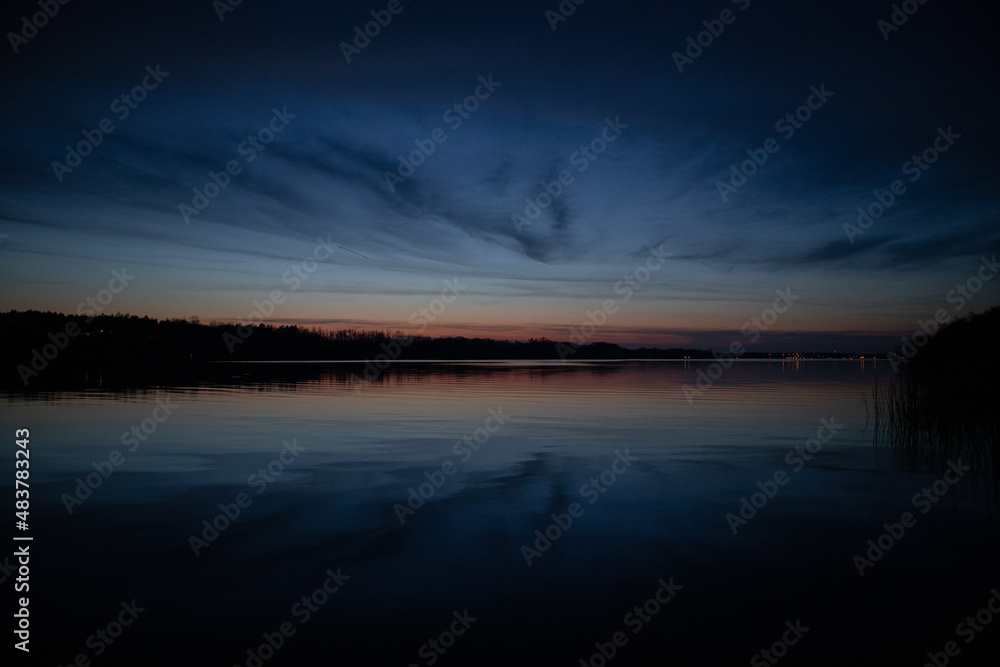 Fototapeta premium blue sunset over lake