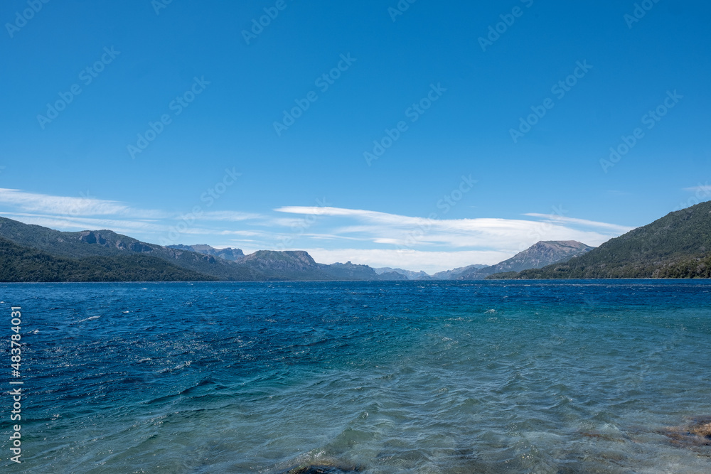 	
View of the lake in the mountains. Argentine Patagonia. Summer day in nature.	
