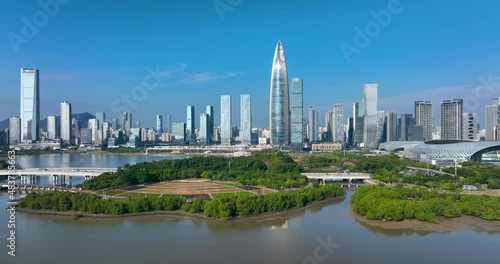 Drone fly over Shenzhen city central business district, aerial panorama China.   photo