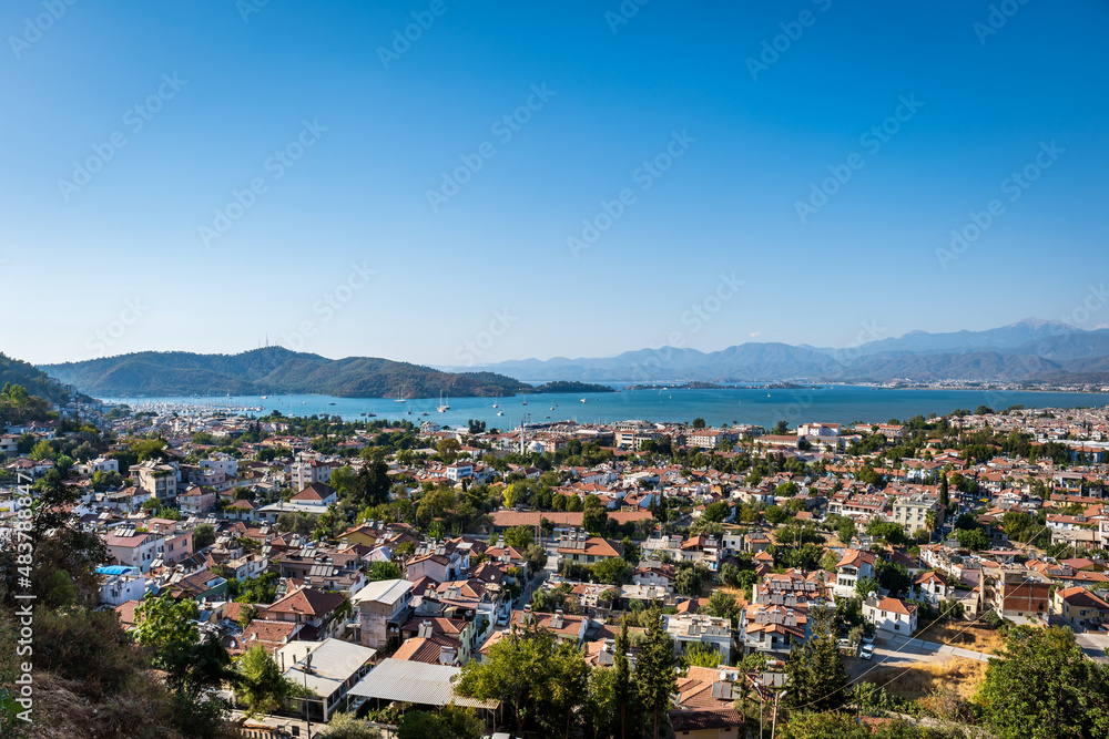 Fethiye landscape and cityscape, aerial view of the popular resort city of Fethiye and the Bay of the Mediterranean sea, Turkey.