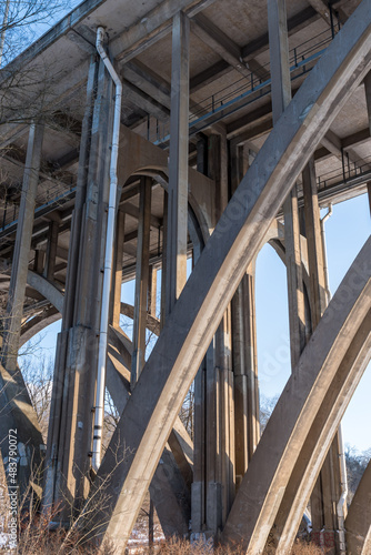 The underside of the Parkway East, state route 376. bridge over Commercial Street in Frick Park located in Pittsburgh, Pennsylvania, USA on a sunny winter day © woodsnorth