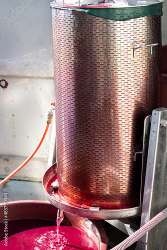 Photography making of red wine  by winepress