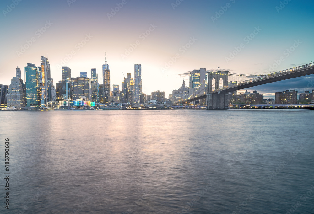 view of new york city skyline at sunset with brooklyn bridge - NYC, Brooklyn Heights, USA