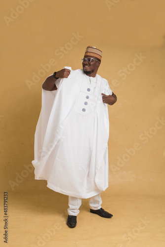 A Traditionally Dressed Northern Business Man Dancing