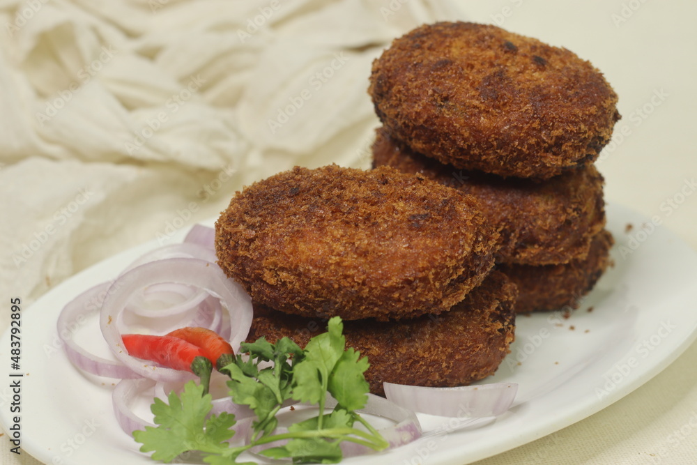 Deep fried Chicken Cutlets. A flat croquette of minced meat covered in bread crumbs and fried Deep fried Chicken Cutlets. A flat croquette of minced meat covered in bread crumbs and fried
