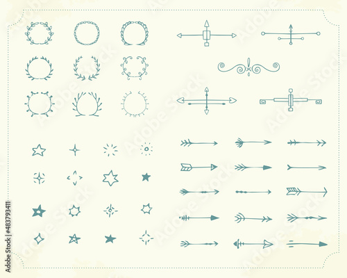 Set of hand-drawn black handle elements. Decorative design elements. Arrows, stars, lights, laurel wreaths, . Vector.